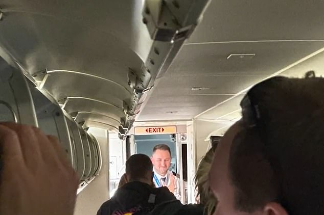 A passenger said the airline had underestimated the severity of the incident, with those on the plane fearing they would die (photo in the cabin)