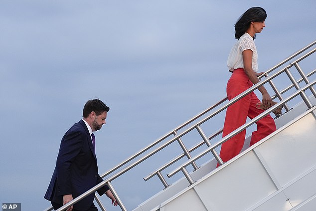 Usha Vance boards the plane ahead of her husband JD on August 7, 2024