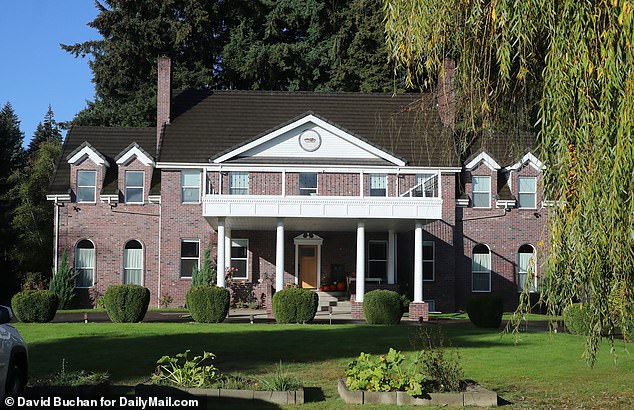 DailyMail.com can reveal that Lenz was referring to Wild Branch Ministries, a small covenant church whose devotees lived 'commune style' in a million-dollar mansion in Battle Ground, Washington, known as The Big House (pictured) – which has since has been sold