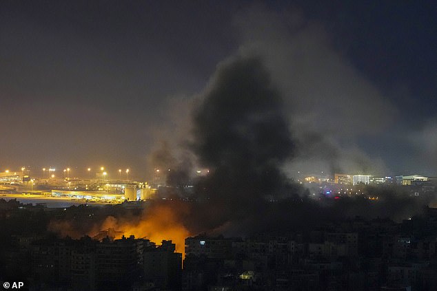 Smoke rises from an Israeli airstrike in Dahiyeh, Beirut, Lebanon this evening