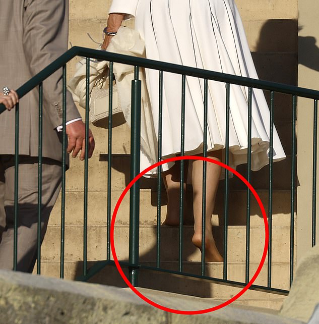 1729646163 866 Queen Camilla ditches her shoes and goes barefoot after a