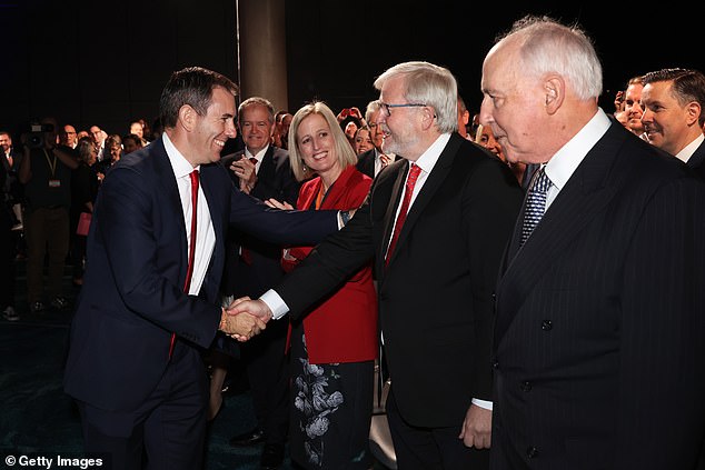 Jim Chalmers is seen smiling as he greets Kevin Rudd during Labour's 2022 federal election campaign. Albo and Rudd have long been close