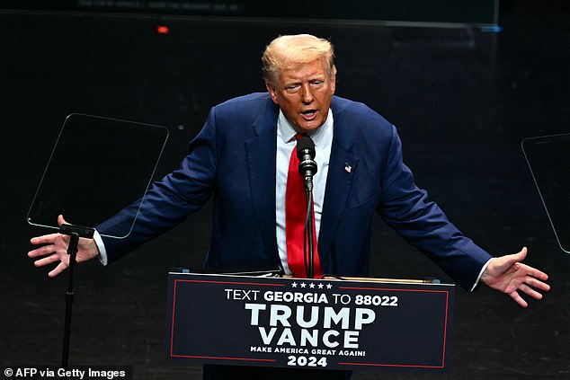 Former US President and Republican presidential candidate Donald Trump speaks during a campaign rally at the Johnny Mercer Theater Civic Center in Savannah, Georgia,