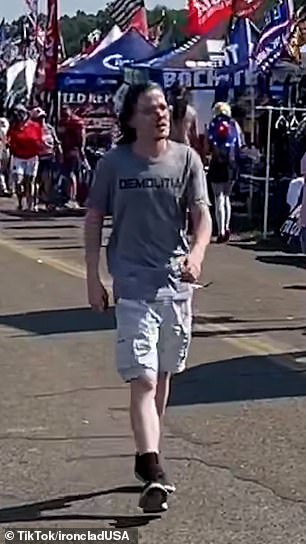 Crooks is pictured walking around the Trump rally before opening fire hours later, killing one attendee, seriously wounding two others and grazing the former president's right ear