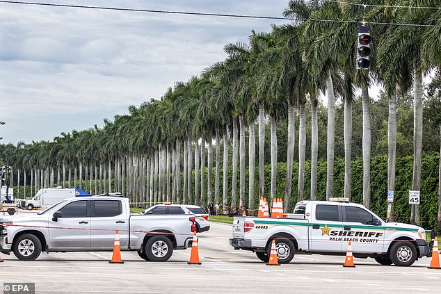 FBI agents check the side of the Trump International Golf Club in West Palm Beach, Florida, in September after what appeared to be an attempted assassination of Donald Trump