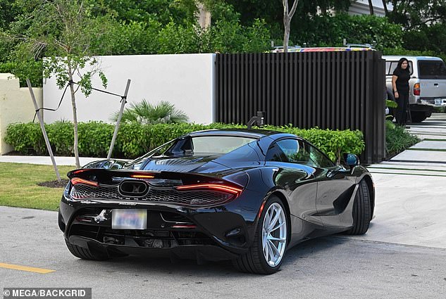 Beckham arrives at the house in his McLaren 750S, which sells for over £240,000 new