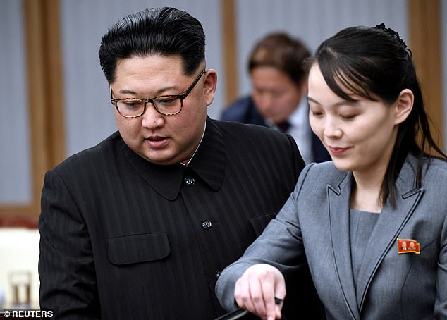 North Korean leader Kim Jong-un and his sister Kim Yo Jong attend a meeting in 2018