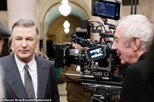 The statement announcing his death read: 'It is with the utmost sadness that we learn of the passing of our friend and colleague Dick Pope BSC' (Pictured with Alec Baldwin in 2019)