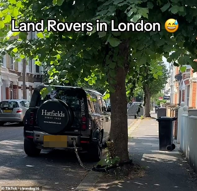 The Landrover was parked on a quiet street in London, outside a house