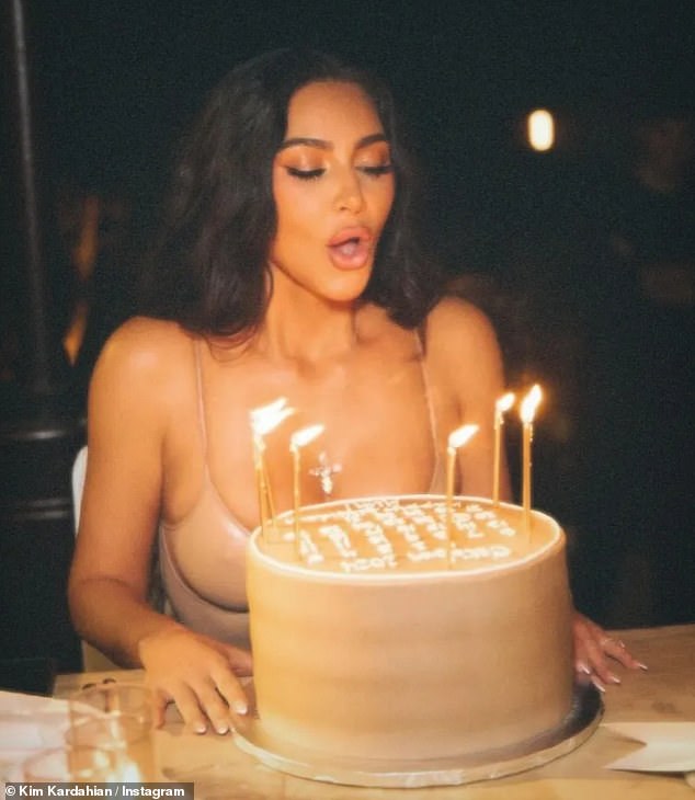 The beauty made a wish as she blew out the candles on her birthday cake