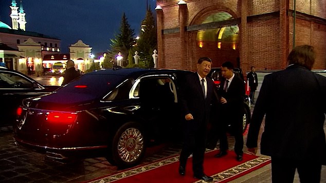 Meanwhile, Jinping was later seen rolling into his car and casually getting out before strolling to the meeting spot