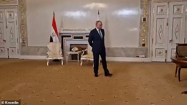 Putin was seen shuffling as he waited for his Egyptian counterpart