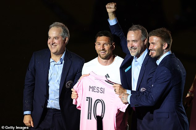 Messi was unveiled to fans in July 2023 by David Beckham (r) and the owners of Inter Miami