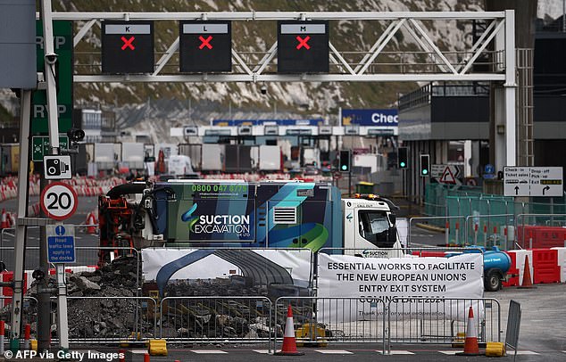 A sign warns travelers arriving at the Port of Dover about the work underway to facilitate the European Union's new and much delayed entry-exit system