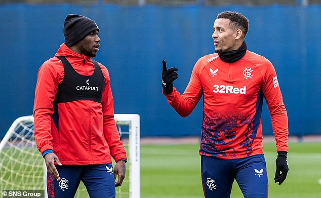 Captain James Tavernier, right, speaks to Dujon Sterling ahead of the Europa League match