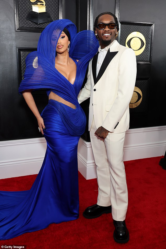 On July 31, Cardi filed for divorce from Offset — four years after she first filed for divorce (in September 2020); pictured on February 5 at the Grammys