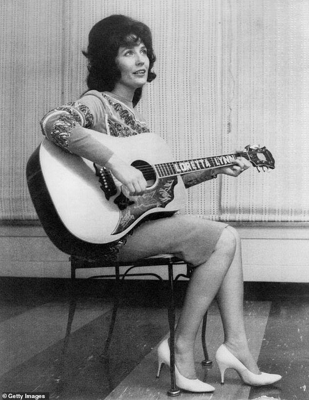 Some of Loretta Lynn's personal items are on display throughout the mansion, including original albums and guitars; seen in 1965