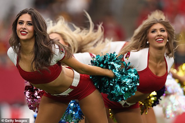 The Cardinals cheerleaders perform during a game at State Farm Stadium on September 29