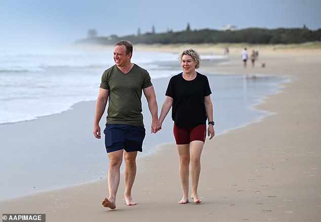 The Prime Minister enjoyed some downtime with his wife Kim McDowell at Marcoola Beach on the Sunshine Coast on Thursday morning