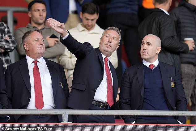 He suggested that technical director Jason Wilcox (middle) was against activating the purchase option