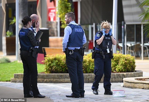 The alleged attack took place in front of shocked customers and staff. In the photo the police are on the scene