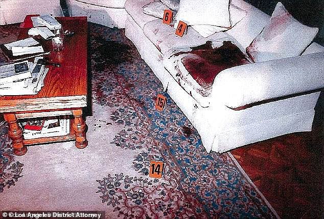 Chilling crime scene photos show blood-soaked couch where Jose Menendez was shot