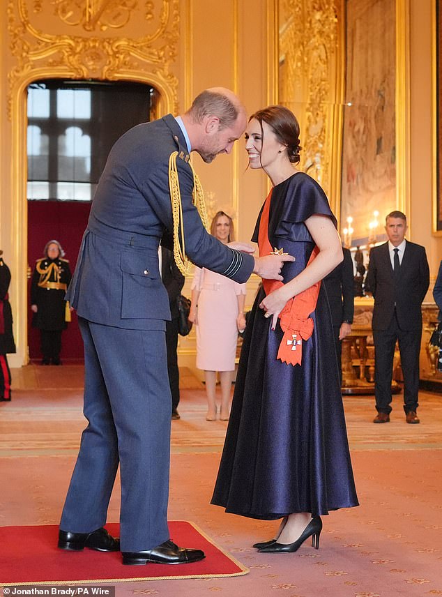 Ardern is appointed a Dame by the Prince of Wales at a ceremony at Windsor Castle