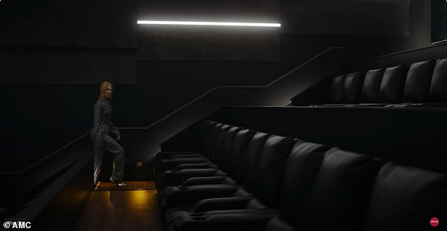 The AMC ad shows Nicole arriving at an AMC movie theater and taking off the hood of her jacket as she takes a seat in the theater to watch a movie.