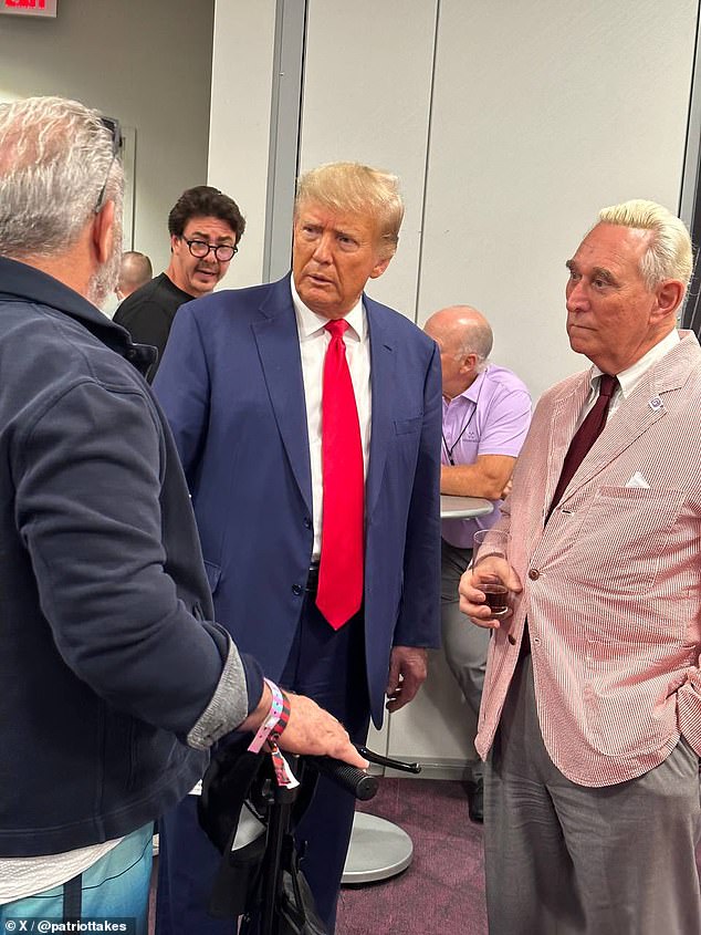 Donald Trump in conversation with Mel Gibson and Roger Stone