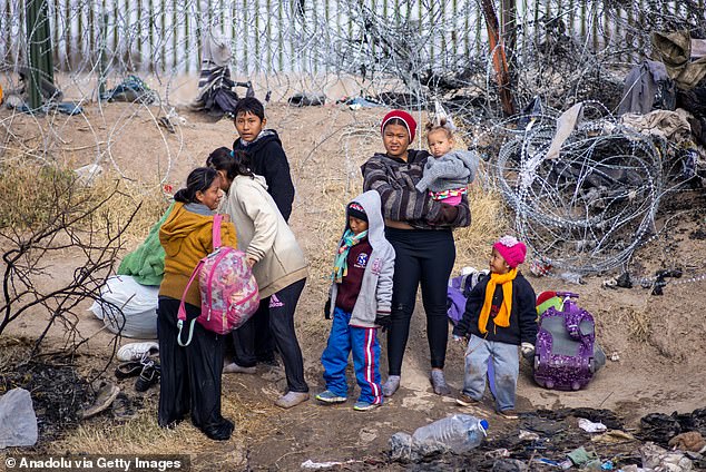 Migrants, including women and children, prepare to cross the Rio Grande to reach the United States border to seek humanitarian asylum in Ciudad Juarez, Mexico