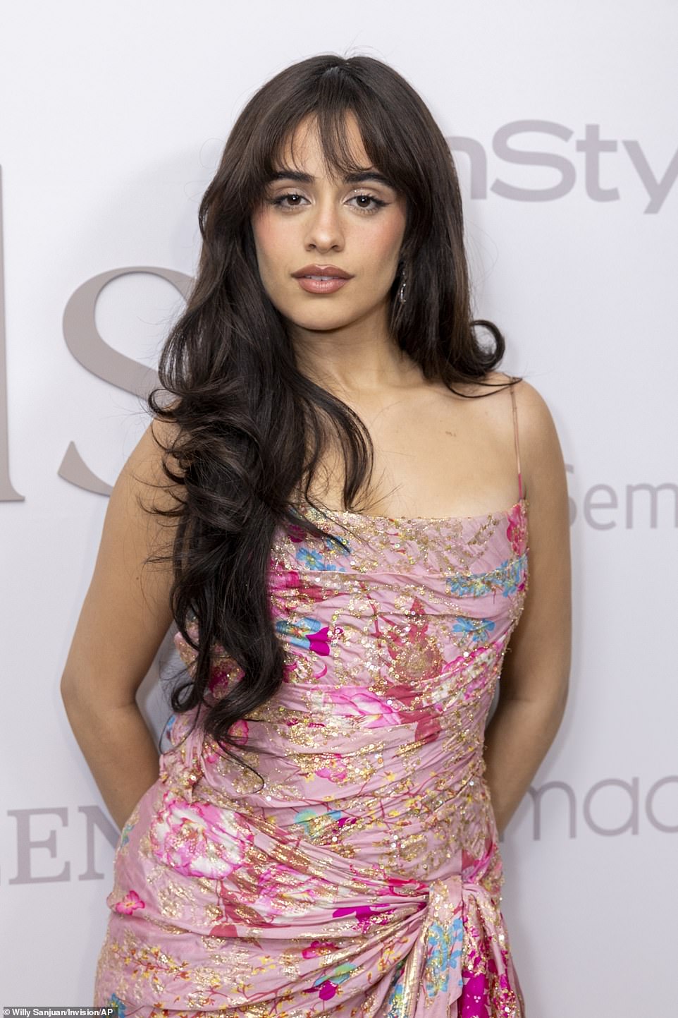 Cabello's enviably long hair fell in voluminous, curly locks down to her waist