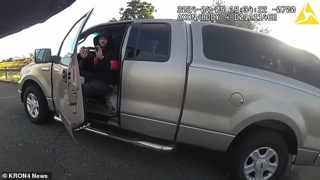 Body camera footage of the incident showed Faison with his hands up in a truck as Officer Knea pulled out a gun and told him to get out of the vehicle.