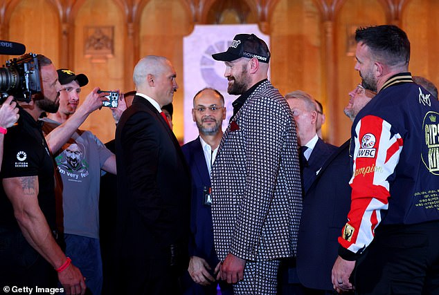 Usyk (left) and Fury faced off at a press conference ahead of their rematch on Wednesday