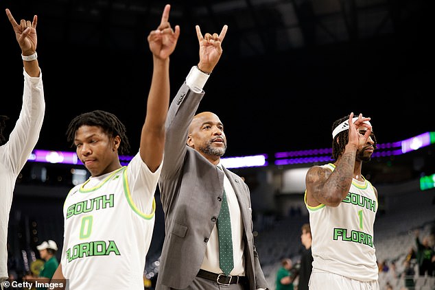 Abdur-Rahim greets the crowd during last year's AAC Men's Basketball Championship.