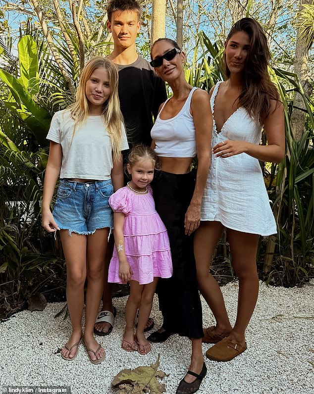 Speculation about a split arose this week when Lindy, 45, posed for a portrait with her four children without Ellis. After posting the image to Instagram, eagle-eyed followers noticed that the real Balinese princess was no longer wearing her engagement ring. (Pictured)