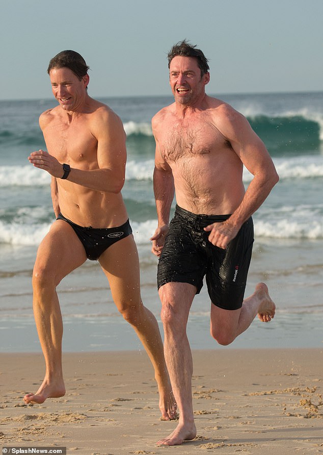 Jackman - who is an outspoken advocate for LGBTQ rights - has ridiculed the rumors over the years (pictured with his personal trainer in 2017)