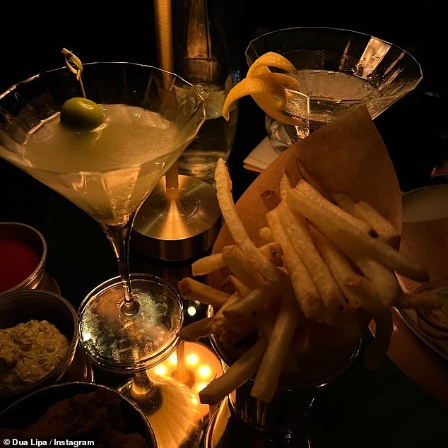 Sharing a photo of her martinis she captioned the post: 'one is nasty and the other has a twist'