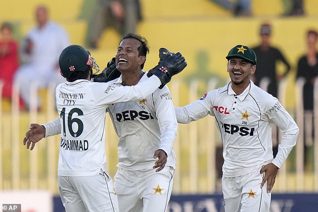 Pakistan's Noman Ali celebrates after taking the Pope's wicket in Rawalpindi