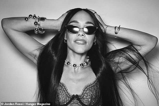 Posing in a selection of black and white photos, Alex looked effortlessly cool in a lace bralette and sunglasses