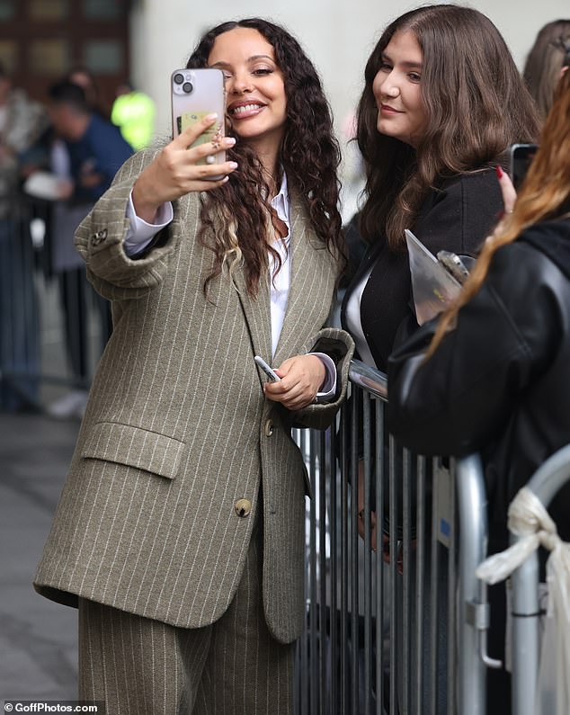 After Jade's performance, she left the BBC studios and posed with fans camped outside the broadcaster