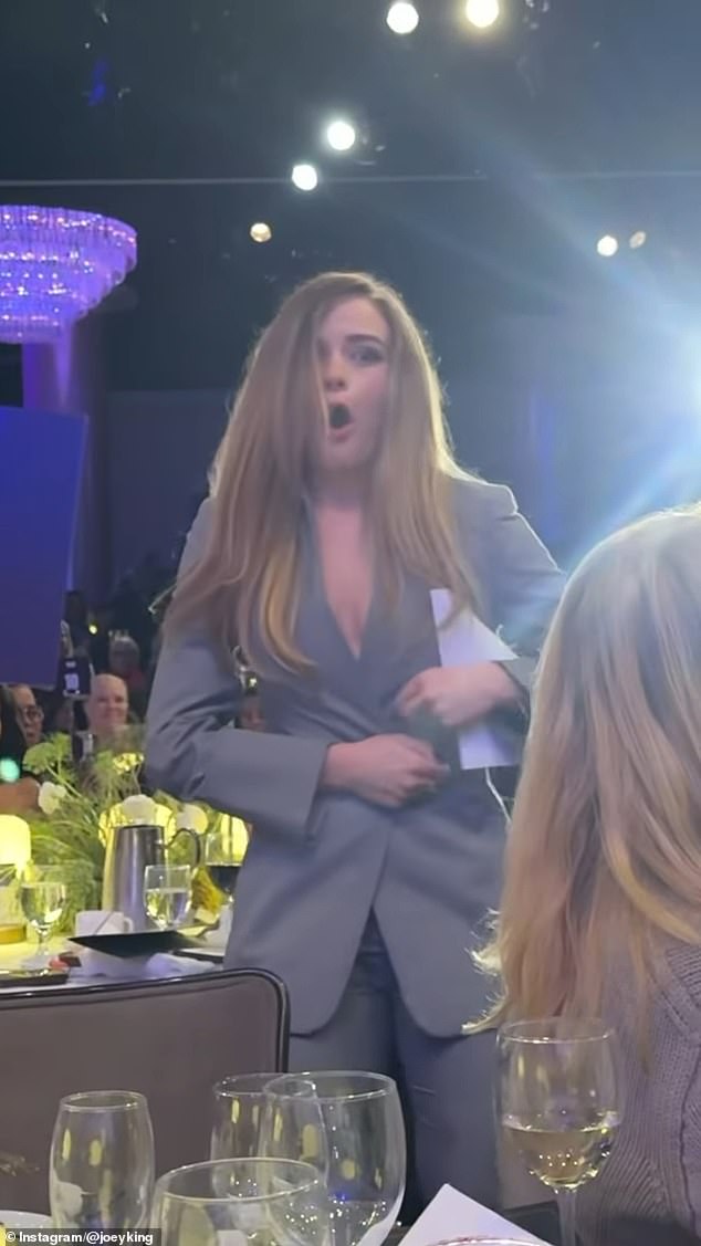 While on her way to the stage at the Beverly Hilton Hotel in Los Angeles, the 25-year-old actress' blazer popped open, leaving her struggling to keep it closed.