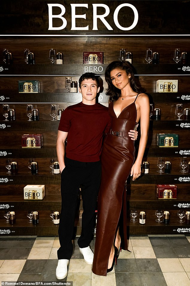 The Spider-Man star, 28, posed with his beloved actress, 28, in matching ensembles at the launch of his non-alcoholic beer event BERO