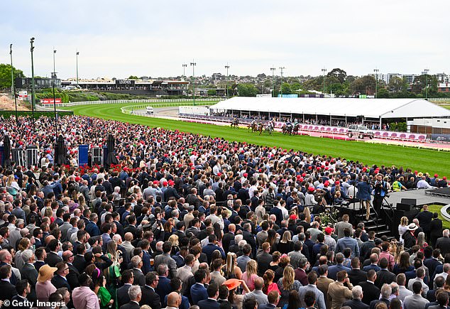 A packed crowd is tipped to watch the Cox Plate live, first staged in 1922 (photo, racegoers trackside last year)