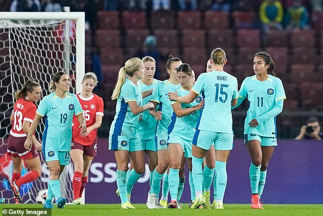 Caitlin Foord of Australia celebrates her goal with her teammates in the draw against Switzerland