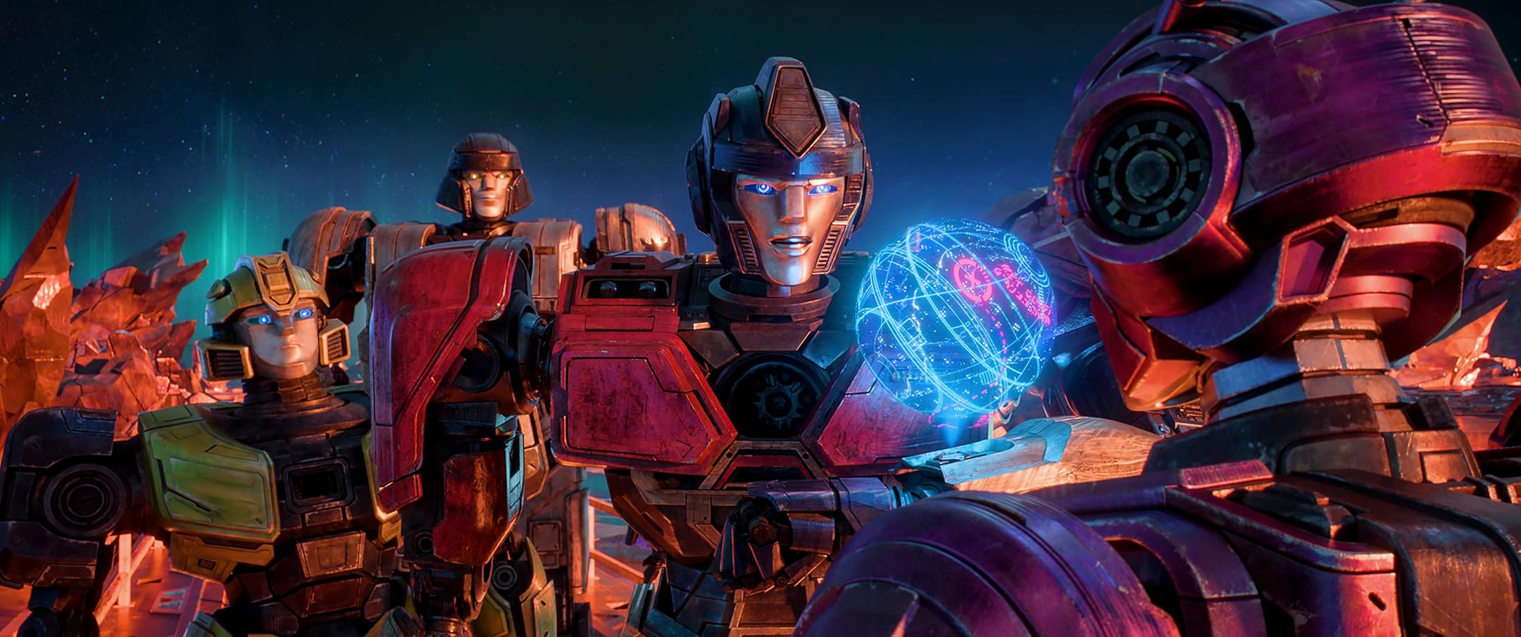 B-127, D-16, Orion Pax and Elita-1 consider a map of Cybertron in a still from Transformers One