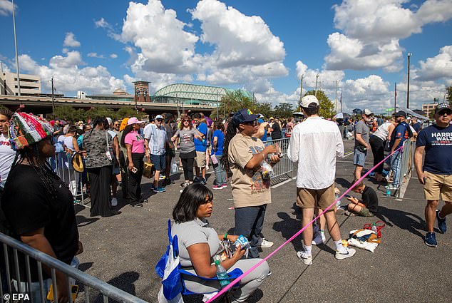 Lines to attend the Kamala Harris rally in Houston snaked through the parking lot as people decked out in Harris-Walz gear waited for hours to get in