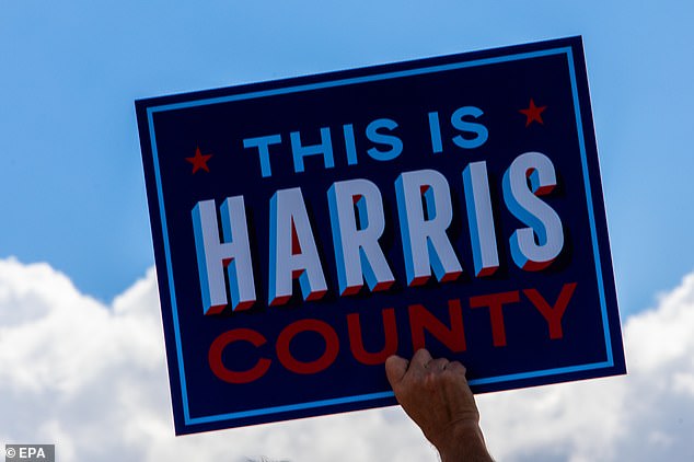 A supporter holding a 