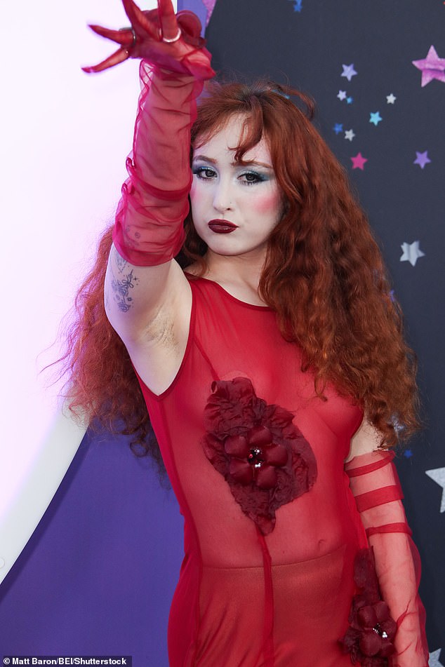 With her exaggerated makeup and dramatic poses, Chappell was a must-see as she walked the red carpet at the premiere