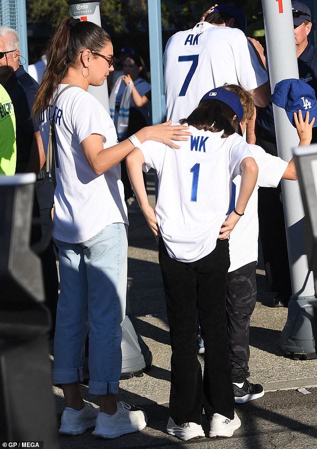 Dressed in matching blue and white Dodgers jerseys, Ashton bore his initials