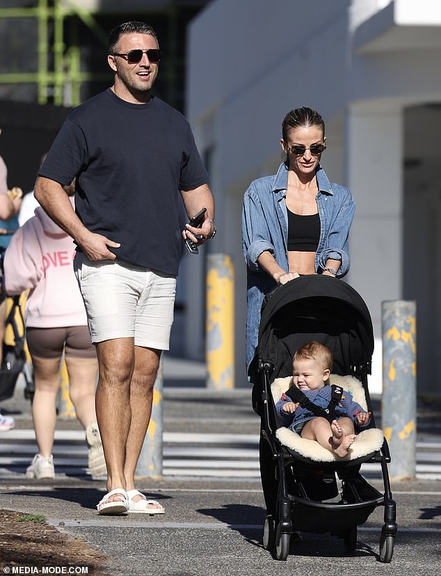 Sam seemed excited about the family outing with his wife, mother and daughter